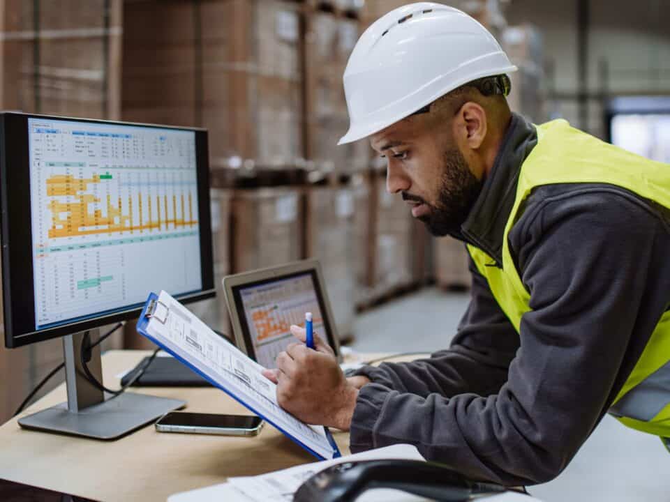 A maintenance manager working on a software